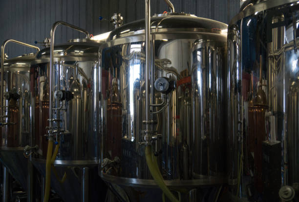 istock Stainless tanks for fermentation in a beer brewery. 1041727198