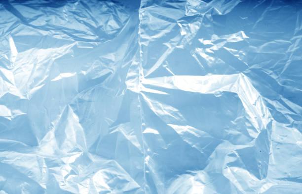 istock Crumpled transparent plastic  surface in navy blue tone. 1041735570