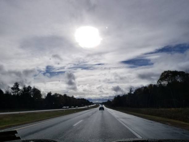 Road less traveled Highway to blue skies traveled stock pictures, royalty-free photos & images