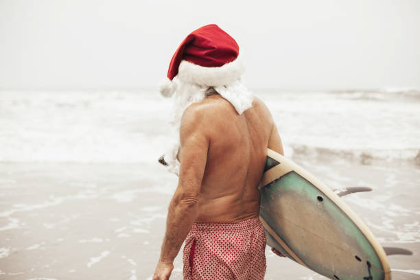 Santa Claus with surf board