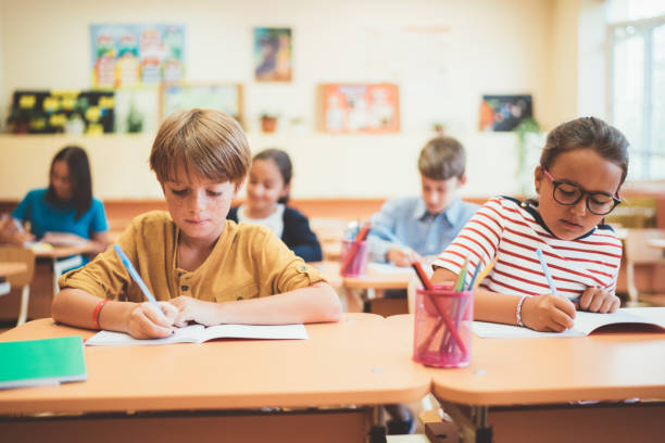 istock Kids studying in the classroom 1041738940