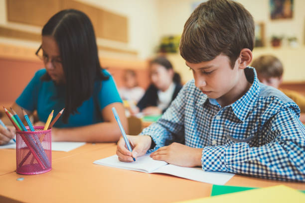 istock Kids studying in school 1041738998