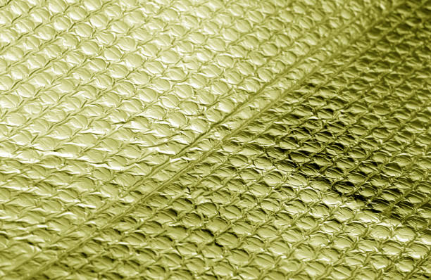 istock Shiny metal surface in yellow color. 1041743788