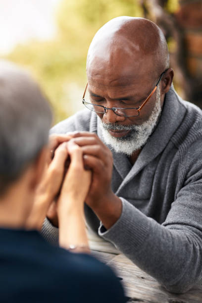 istock Praying with his wife 1041747456