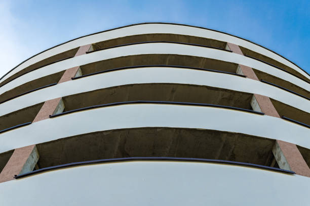 istock Multi level parking area. Spiral architecture building with car garage. 1041747650