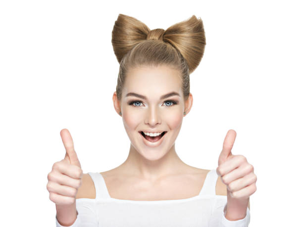 istock Young woman showing thumbs up 1041747912