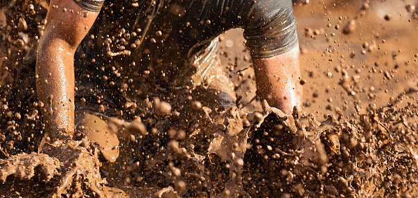 Mud race runners,during extreme obstacle races