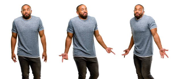 istock African american man with beard making funny face fooling 1041756264