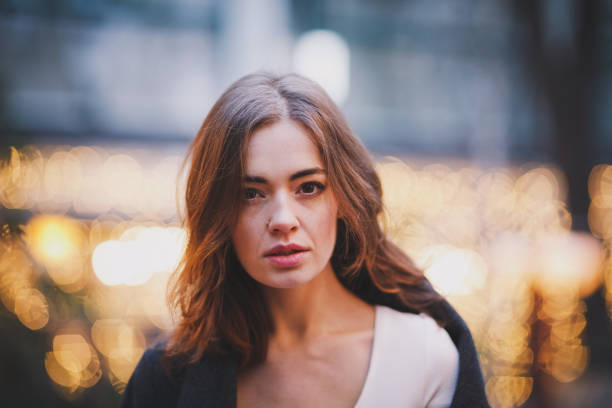 istock Charming young woman smiling with eyes closed. 1041756284