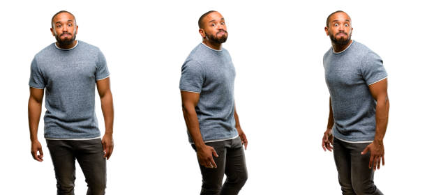 istock African american man with beard puffing out cheeks, having fun making funny face 1041756302