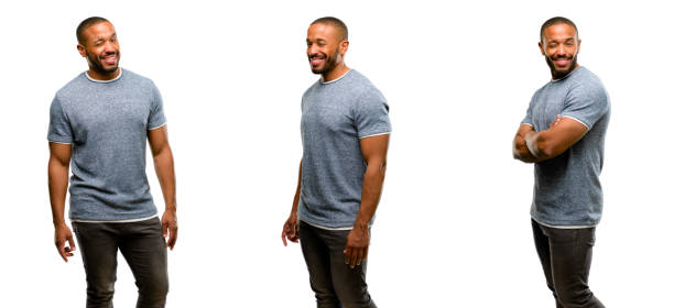 istock African american man with beard blinking eyes with happy gesture 1041756348