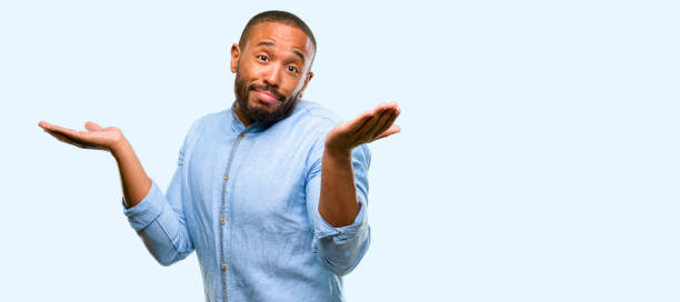 istock African american man with beard doubt expression, confuse and wonder concept, uncertain future 1041757680