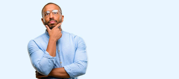 istock African american man with beard doubt expression, confuse and wonder concept, uncertain future 1041757766