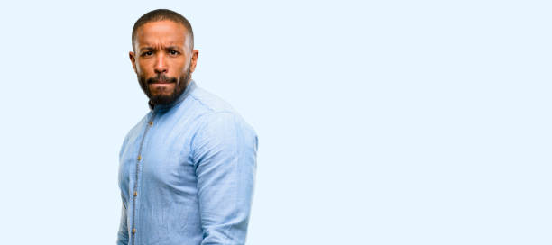 istock African american man with beard doubt expression, confuse and wonder concept, uncertain future 1041757784