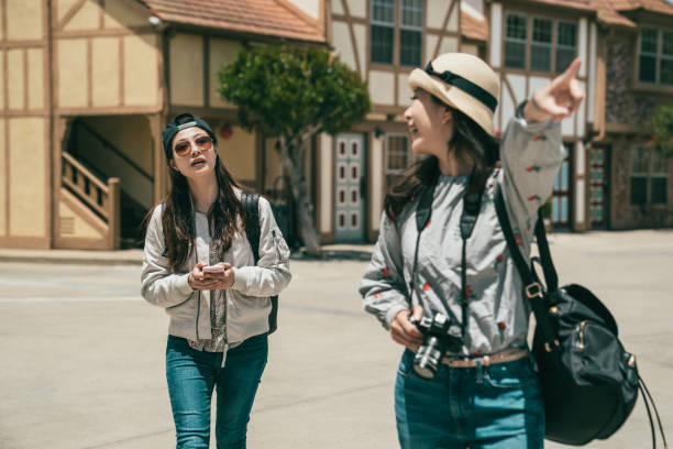 istock friends having sightseeing in an old lovely town 1041769548