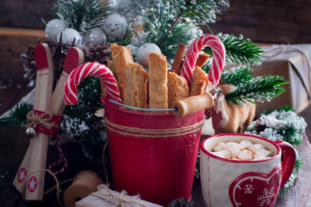 istock Christmas Candy Canes with Christmas decoration on table on bright background 1041774270