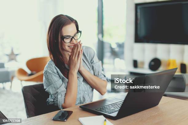 Happy Young Modern Businesswoman Reading Good News On Laptop Stock Photo - Download Image Now