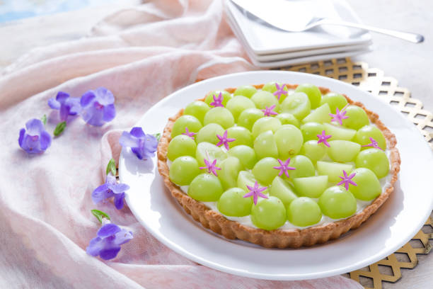 Round tart with fresh grapes
