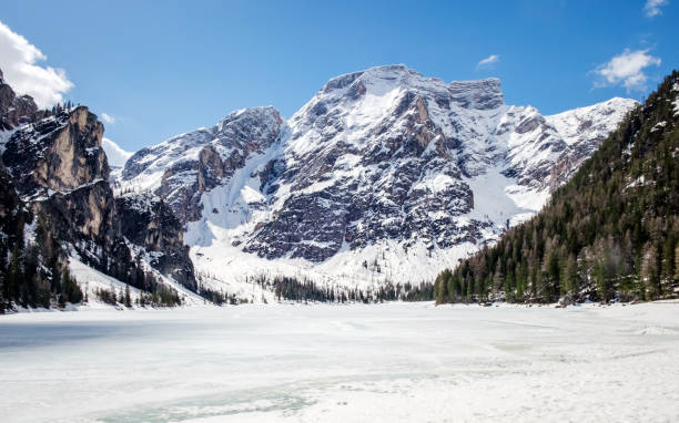 Lake Braies (Italian: Lago di Braies) in winter in Dolomites Alps stock photo