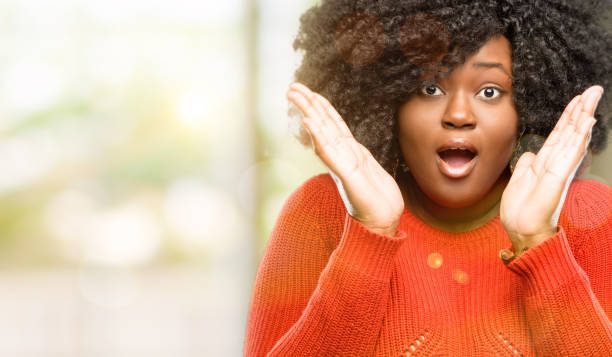 istock happy and surprised cheering expressing wow gesture 1041800976