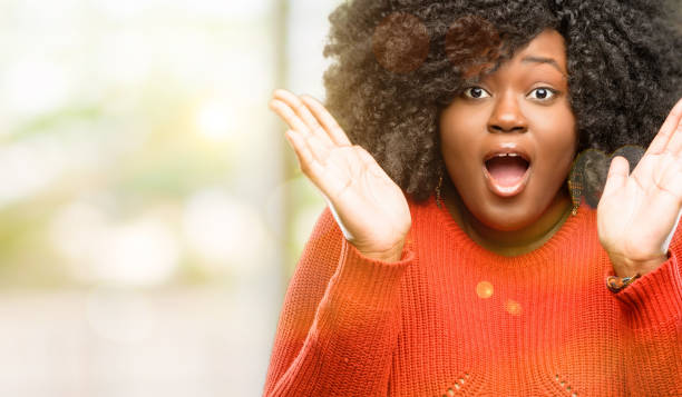 istock happy and surprised cheering expressing wow gesture 1041800980