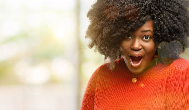istock happy and surprised cheering expressing wow gesture 1041801524