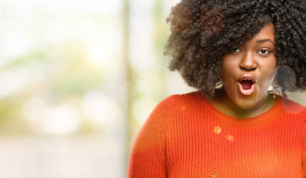 istock happy and surprised cheering expressing wow gesture 1041801644