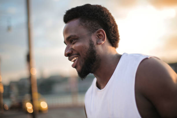 istock Portrait of smiling handsome black guy 1041801658