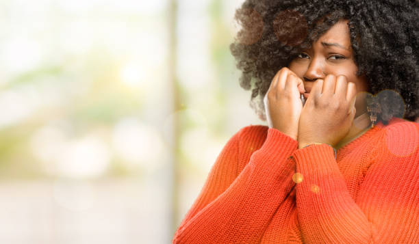 istock terrified and nervous expressing anxiety and panic gesture, overwhelmed 1041801988