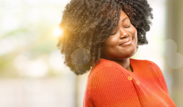 istock confident and happy with a big natural smile laughing looking up 1041803250