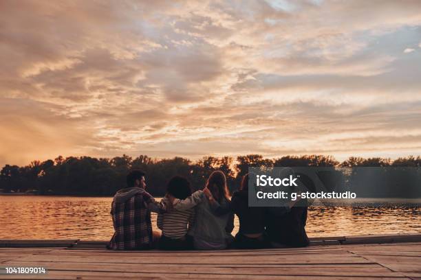 Life Filled With Friendship Stock Photo - Download Image Now - Friendship, Group Of People, Embracing