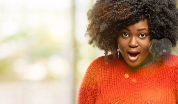 istock happy and surprised cheering expressing wow gesture 1041811580