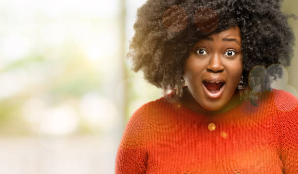 istock happy and surprised cheering expressing wow gesture 1041811590