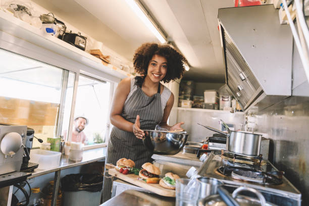 istock Attractive Afro female fast food worker 1041815598