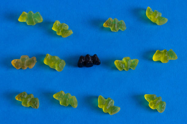 istock Tasty colorful candies on blue background 1041824768