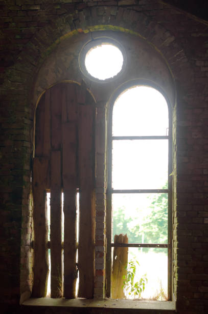 istock old red brick building, broken window of an old building 1041832064