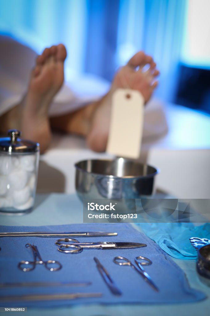 Corpse In Morgue Focus On Toe Tag Stock Photo - Download Image Now ...