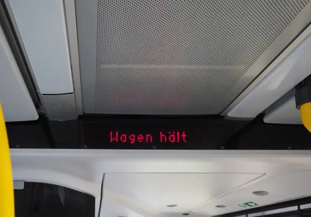 Wagen haelt (meaning Bus stopping) on public transport display