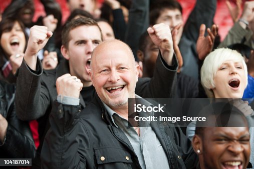 istock Happy man at football match 104187014