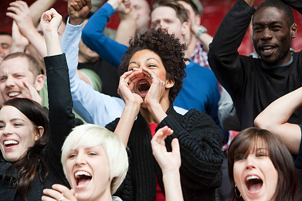 woman shouting at football match - stadium sport crowd spectator 뉴스 사진 이미지
