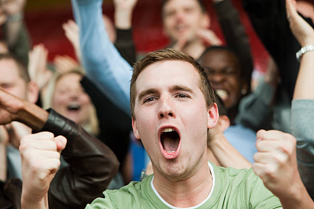 shouting man at football match - stadium sport crowd spectator 뉴스 사진 이미지