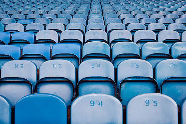 empty seats in football stadium - stadium stands foto potret stok, foto, & gambar bebas royalti