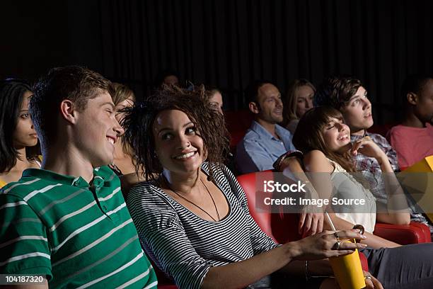 Young Couples Enjoying A Movie Stock Photo - Download Image Now - 12-13 Years, 18-19 Years, 20-24 Years