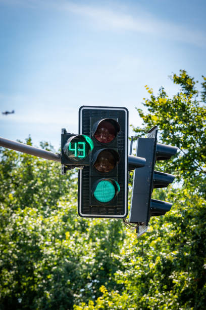 istock green color on the traffic light with count down 1041874748