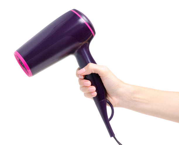 istock Hair dryer in hand 1041892836