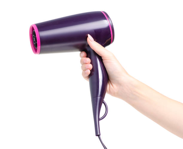 istock Hair dryer in hand 1041892862
