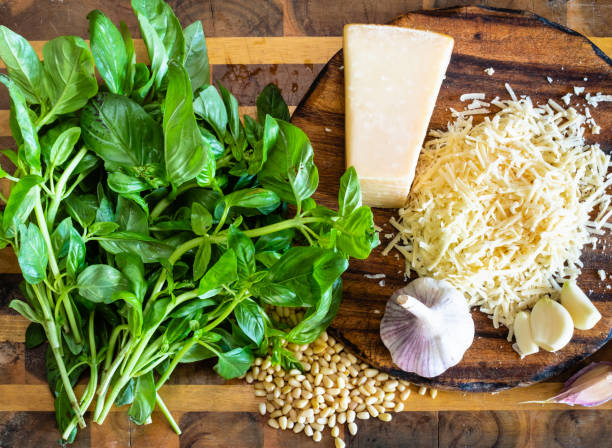various ingredients for Pesto sauce on board