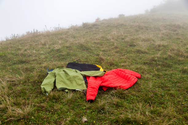 istock Hiking wears on grassy background, 1041918082