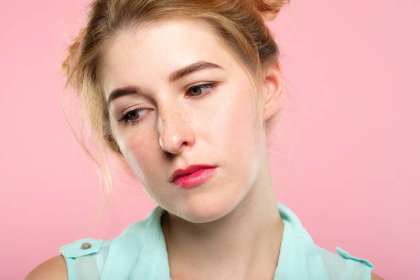 istock facial expression mood bored indifferent woman 1041919110