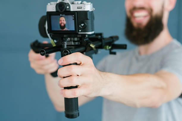 istock video creation social media man shoot camera 1041921064